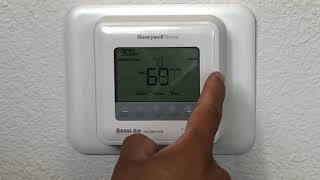 How to Use Your Honeywell T4 Pro Thermostat [upl. by Akit547]