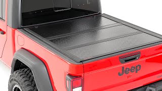 Installing Low Profile Hard Tri Fold Tonneau Cover by Rough Country [upl. by Roshelle]