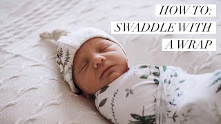 How to Swaddle Baby with a Wrap  Newborn Swaddling [upl. by Imoyaba]