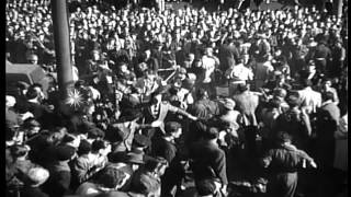 Partisans keep crowd away from dead bodies of Mussolini his mistress Carla PetacHD Stock Footage [upl. by Merilyn]